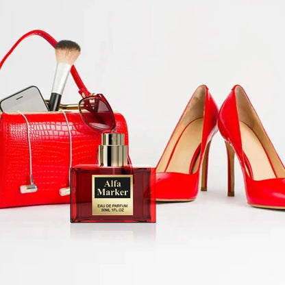 Perfume for Women Long Lasting Fragrance Spray in front of red high heels and stylish handbag.